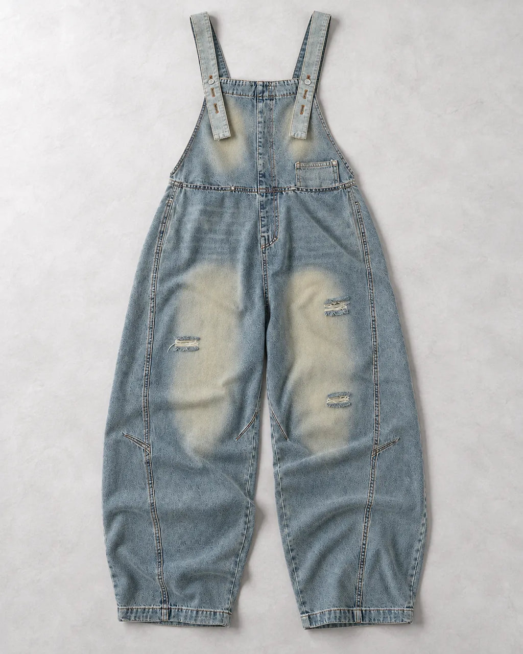 Salopette en jean délavé à effet usé