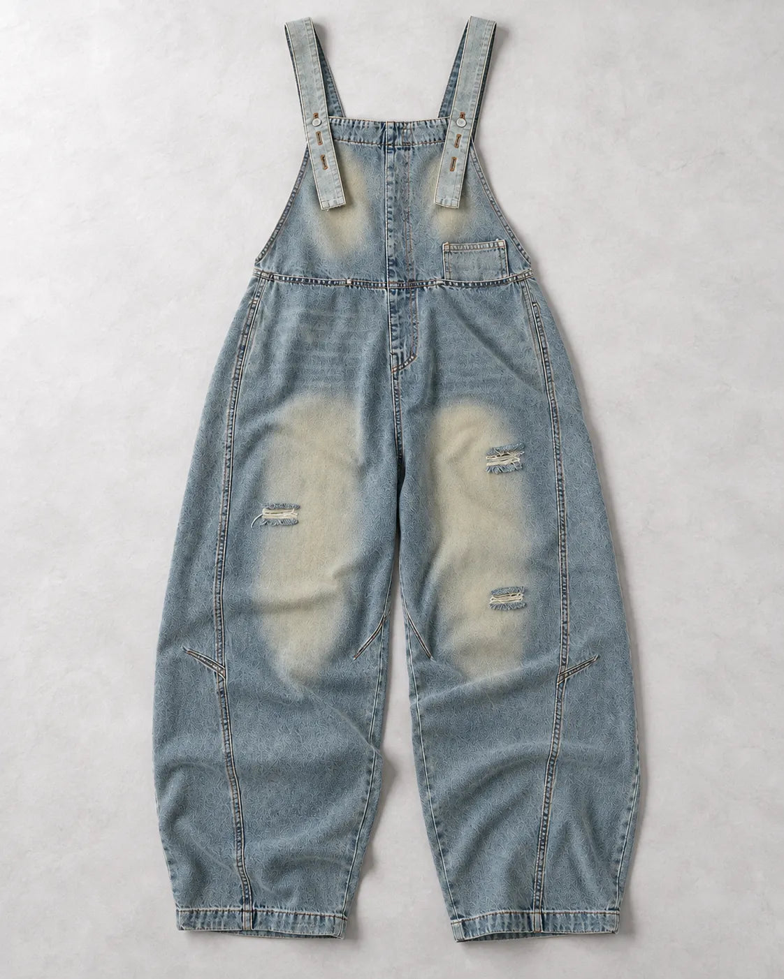 Salopette en jean délavé à effet usé