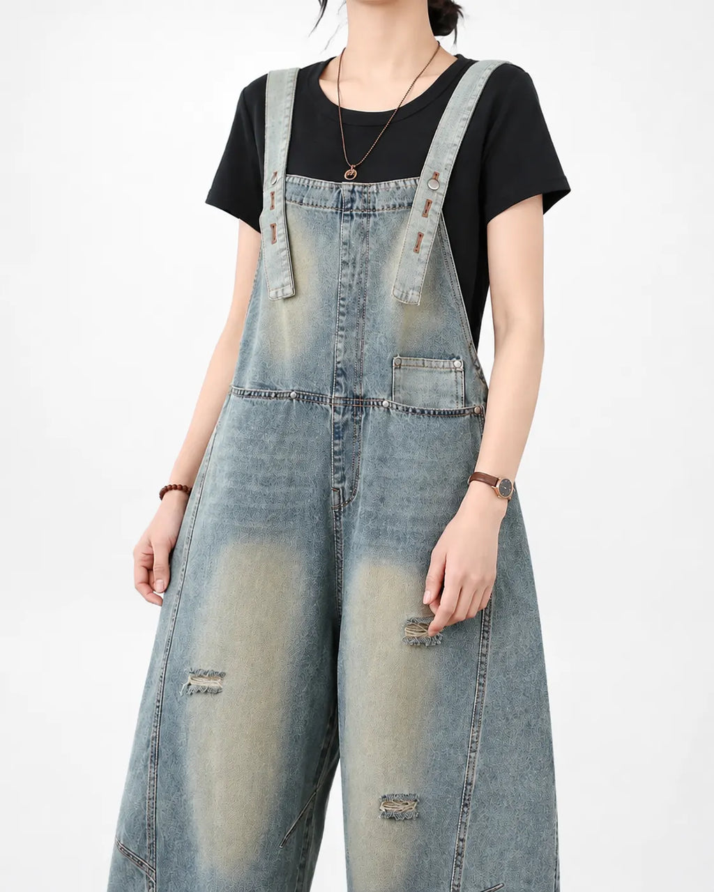 Salopette en jean délavé à effet usé