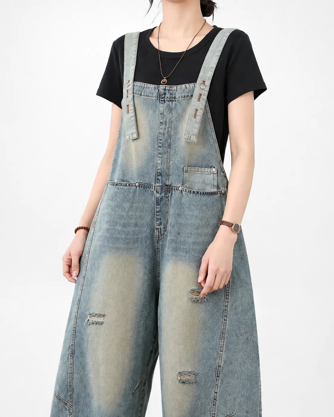 Salopette en jean délavé à effet usé